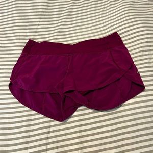 Womens Lululemon speed up shorts.